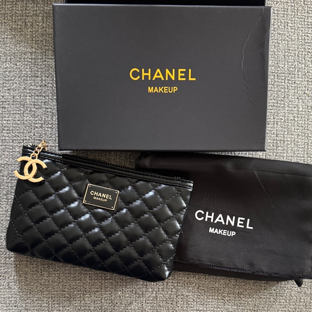 CHANEL Black Quilted Cosmetic Pouch with Gold CC Charm